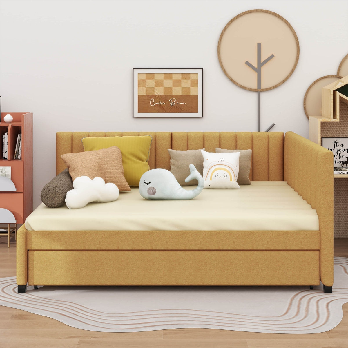Yellow sofa bed with plush toys in a room setting