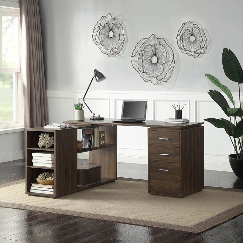 A white L-shaped wooden office desk with storage shelves and drawers, displayed in an office setting with decorative items and a laptop on top.