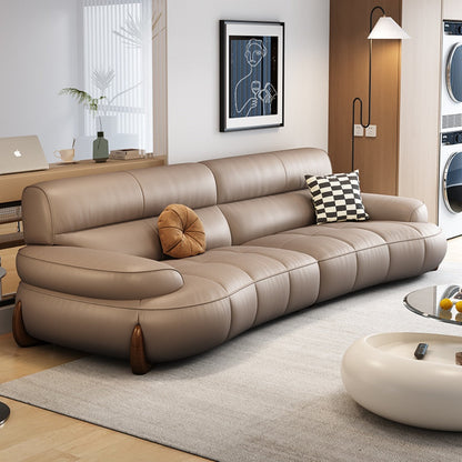 Modular Look Curved Leather Sofa with Generous Rolling Arms
