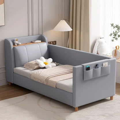 ADOUER WOOD KIDS Upholstered Baby Cot – Modern Padded Toddler Bed with Built-in Headboard Bookshelf and Side Storage Pockets