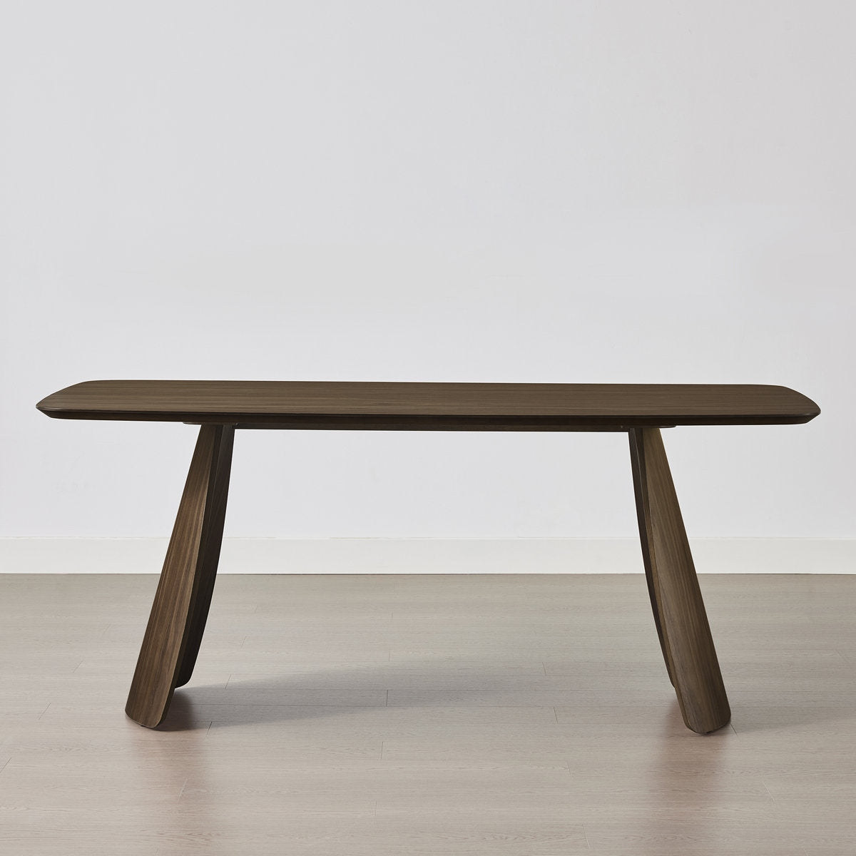 The Arca Sculptural Dining Table: 6-Seater Solid Wood with Curved Tapered Legs