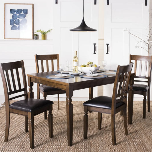 A 4-piece wooden dining set with cushioned chairs, featuring a rectangular table and four chairs with a walnut finish. The set is displayed in a room with a bottle of wine, plates, and cutlery on the table, suggesting a formal or celebratory setting.