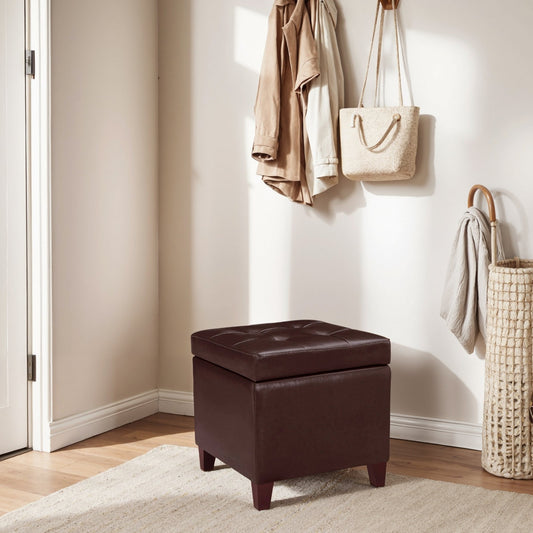Brown leather ottoman in a room with a wall-mounted hook holding bags and clothes.