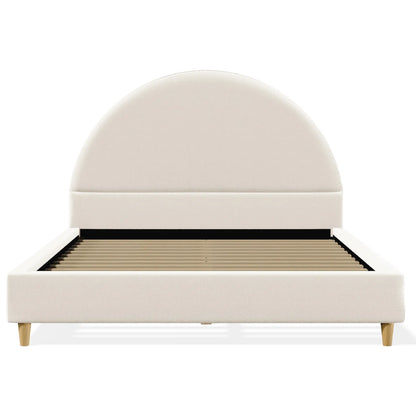 Beige upholstered bed with a rounded headboard on a white background