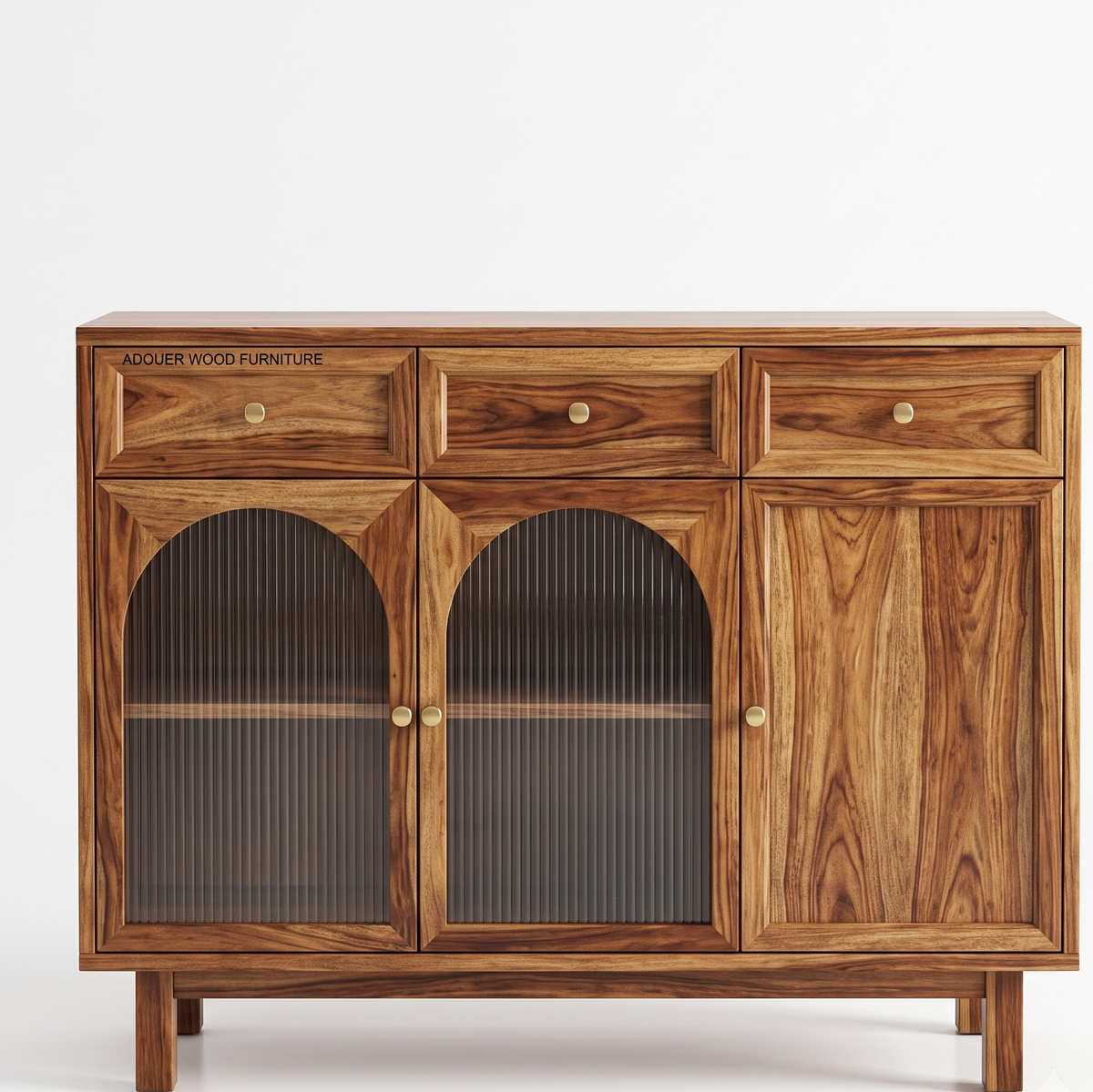 A mid-century modern wooden sideboard cabinet with a warm medium-brown wood grain finish, featuring two arched glass-front doors with ribbed translucent panels, two drawers with brass knobs on the top left, and a single cabinet door with a matching brass knob on the top right. The brand name 'ADOUER WOOD FURNITURE' is printed on the top 