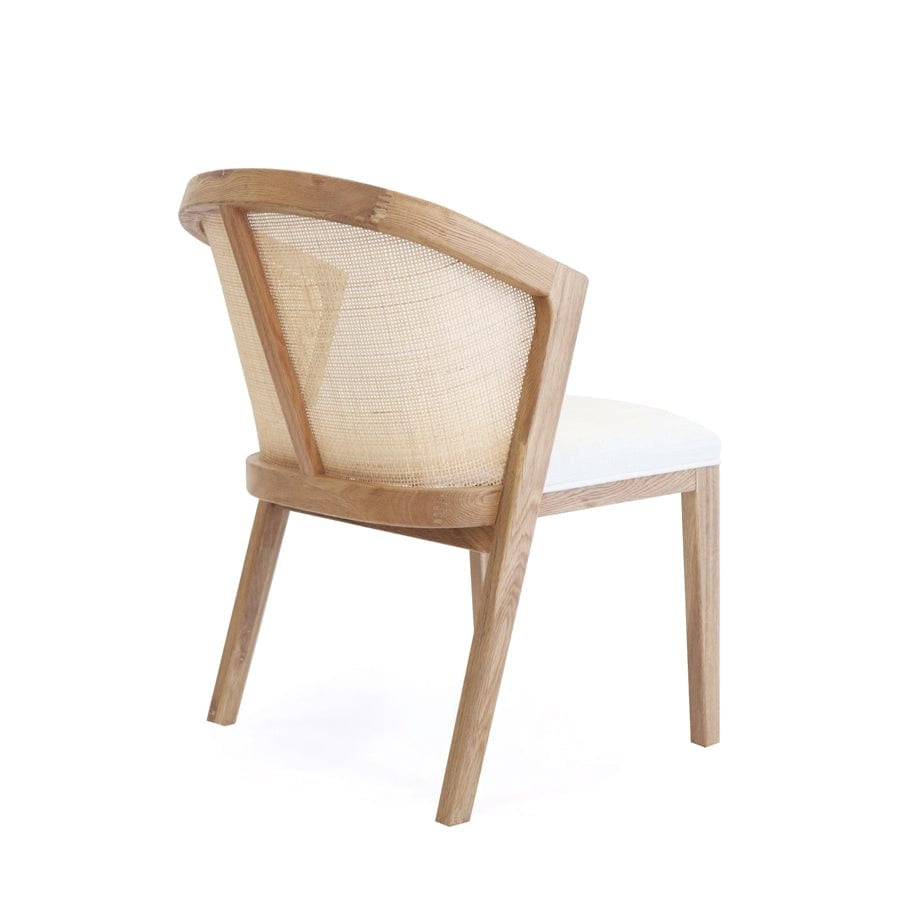 Chair with wooden frame and woven backrest on a white background