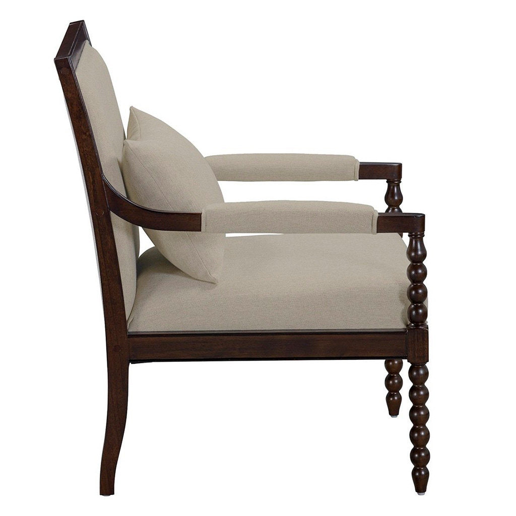 Chair with wooden frame and beige cushion on a white background