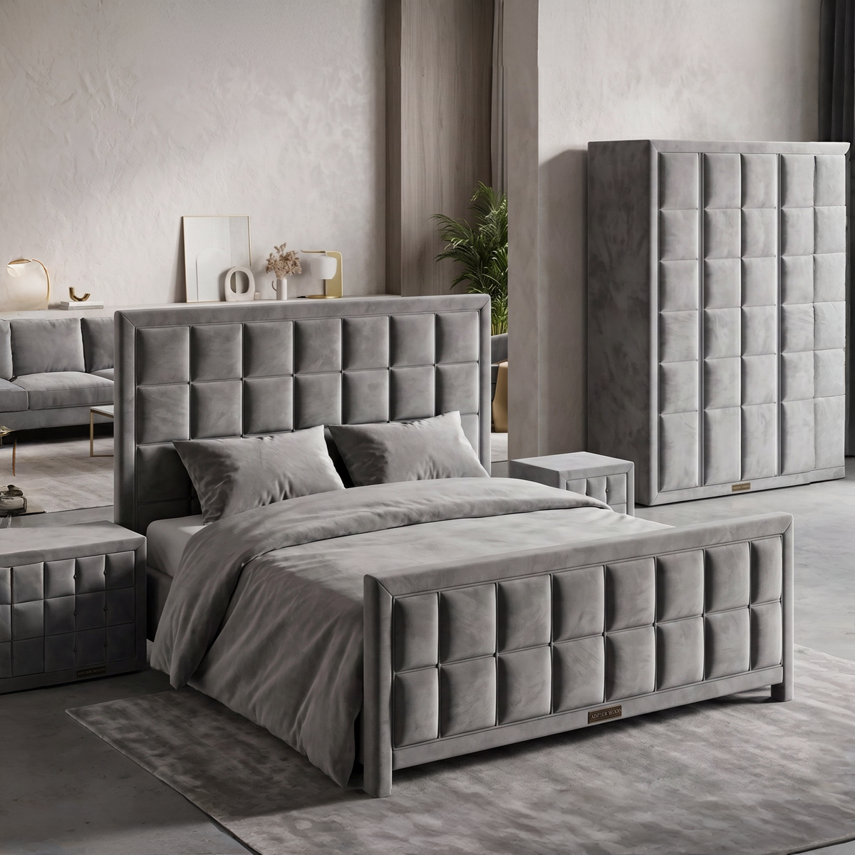 Gray upholstered bedroom set with bed, dresser, and nightstands in a modern room.