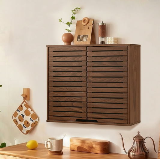 Wooden wall-mounted cabinet with decorative items on a light background