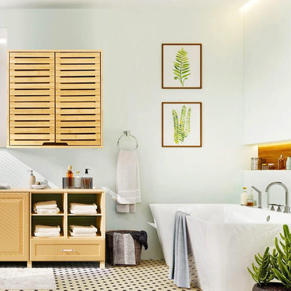 Bathroom interior with wooden cabinet, bathtub, and wall art