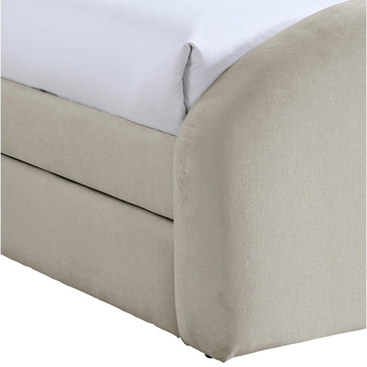 Beige bed skirt on a bed with white bedding