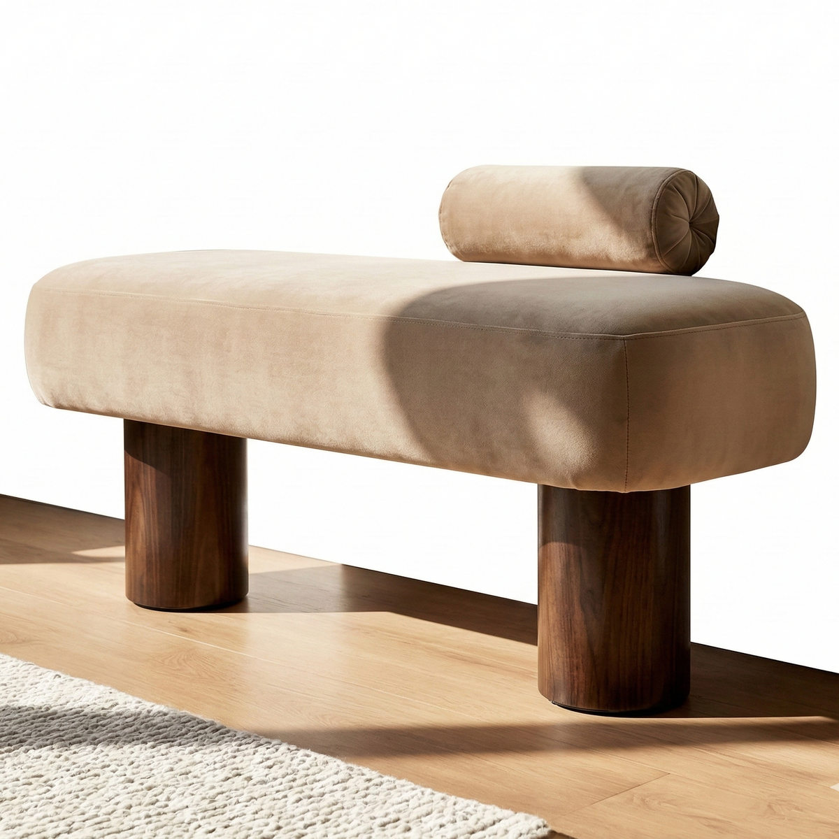 Beige cushioned bench with wooden legs on a light wood floor.
