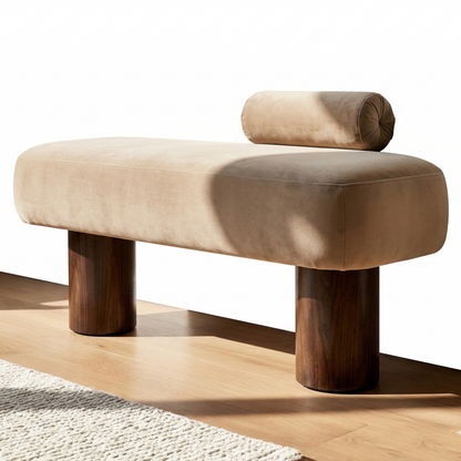 Beige cushioned bench with wooden legs on a light wood floor.