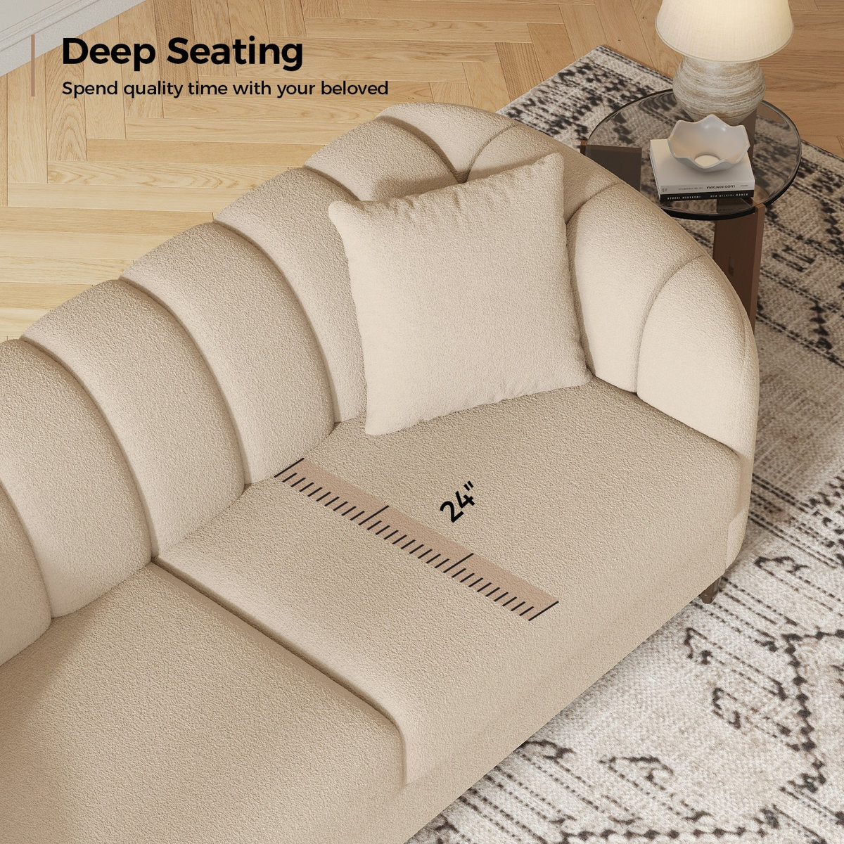 Beige sofa with a deep seating feature labeled, placed in a room with a rug and lamp.