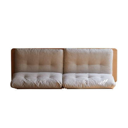 Beige sofa with wooden frame on a white background