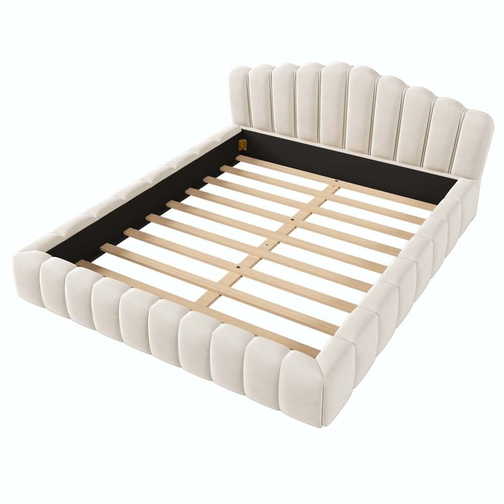 Beige upholstered bed frame with wooden slats on a white background