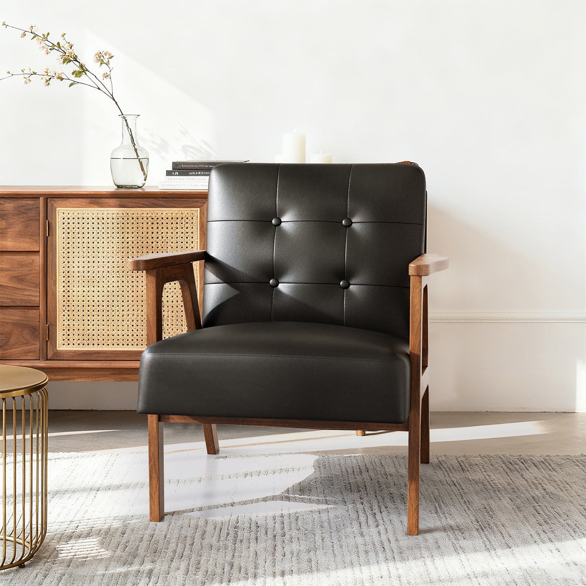 Black leather armchair in a room with wooden furniture and decor.