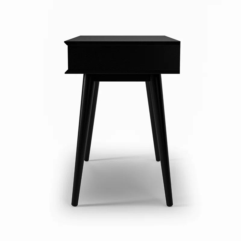 Black side table with a drawer on a white background