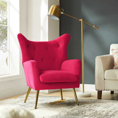 Bright pink armchair in a room with a gold floor lamp and beige sofa.