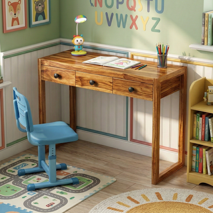 Children's desk with a blue chair in a room with educational decor