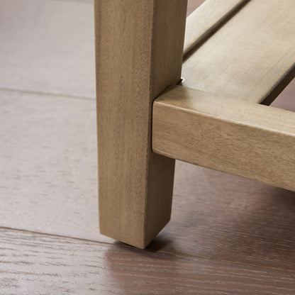 Close-up of a wooden chair leg on a wooden floor
