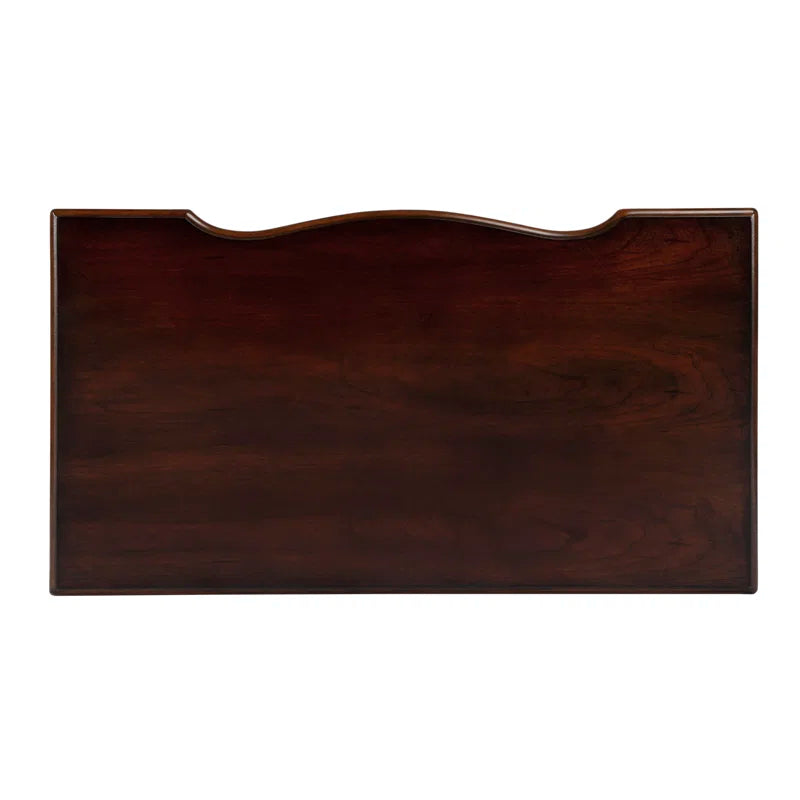 Dark wooden headboard on a white background