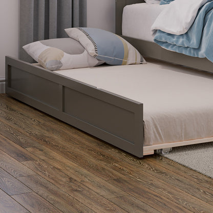 Gray bed with beige mattress and pillows on a wooden floor.