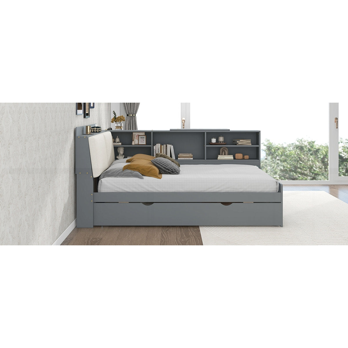 Gray bed with storage compartments in a room with a window and decor.