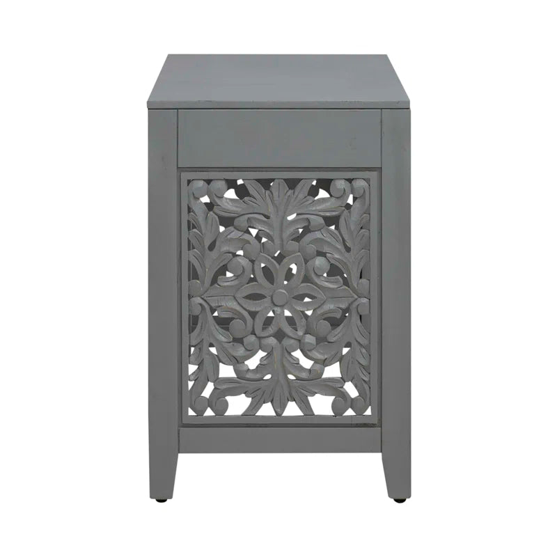 Gray side table with floral patterned drawer on a white background