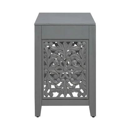 Gray side table with floral patterned drawer on a white background