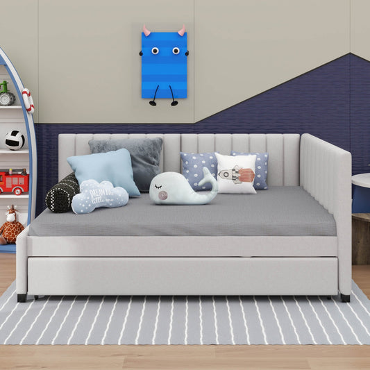 Gray sofa bed with colorful cushions in a room setting