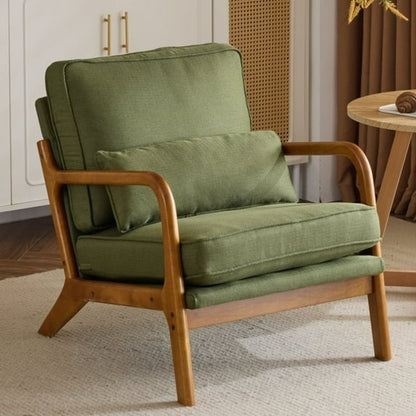Green armchair with wooden frame in a room setting