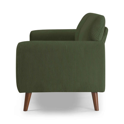 Green armchair with wooden legs on a white background