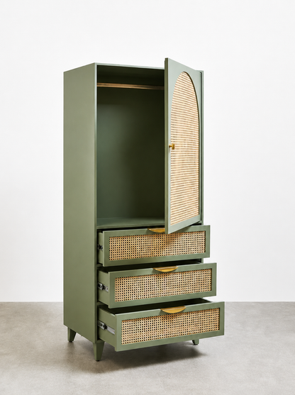 Green cabinet with rattan accents on a white background