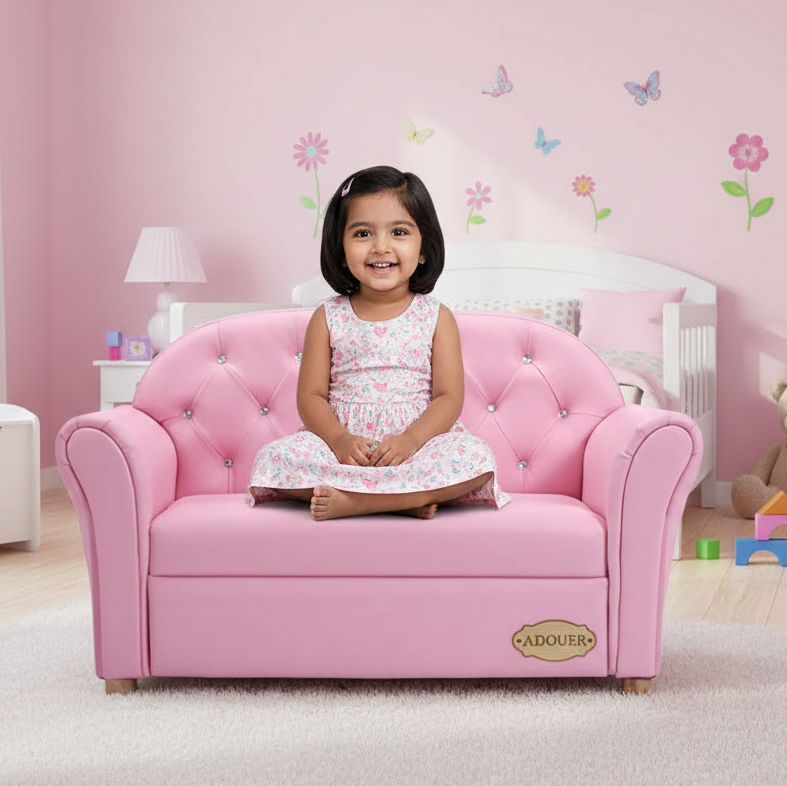 Young girl sitting on a pink children's sofa in a room with butterfly wall decals.