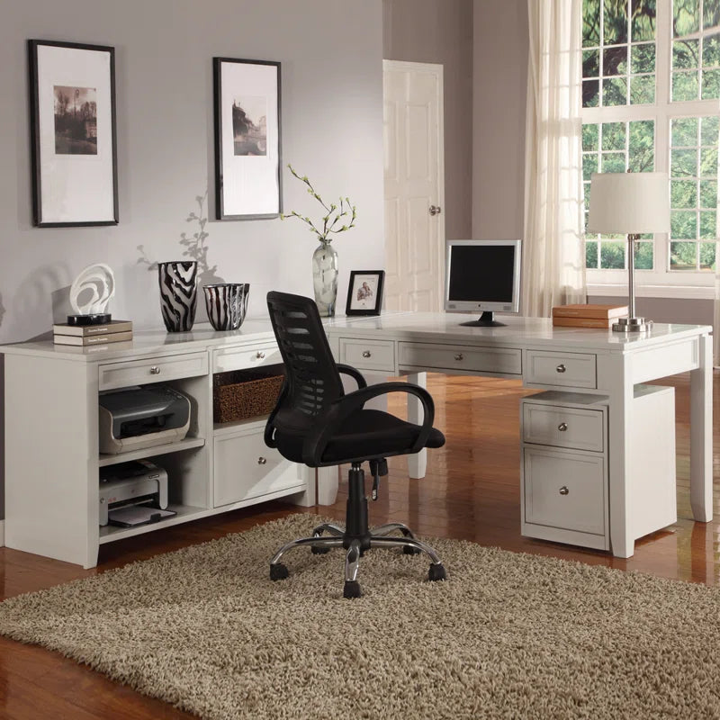 Home office with desk, chair, and decor in neutral tones