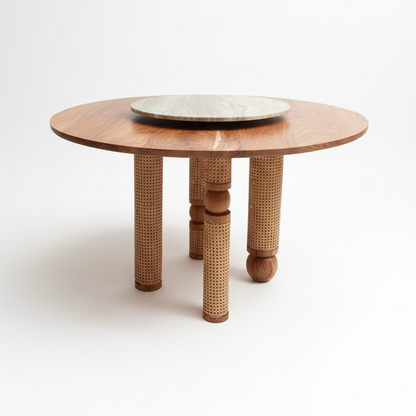 Round wooden table with woven legs on a white background