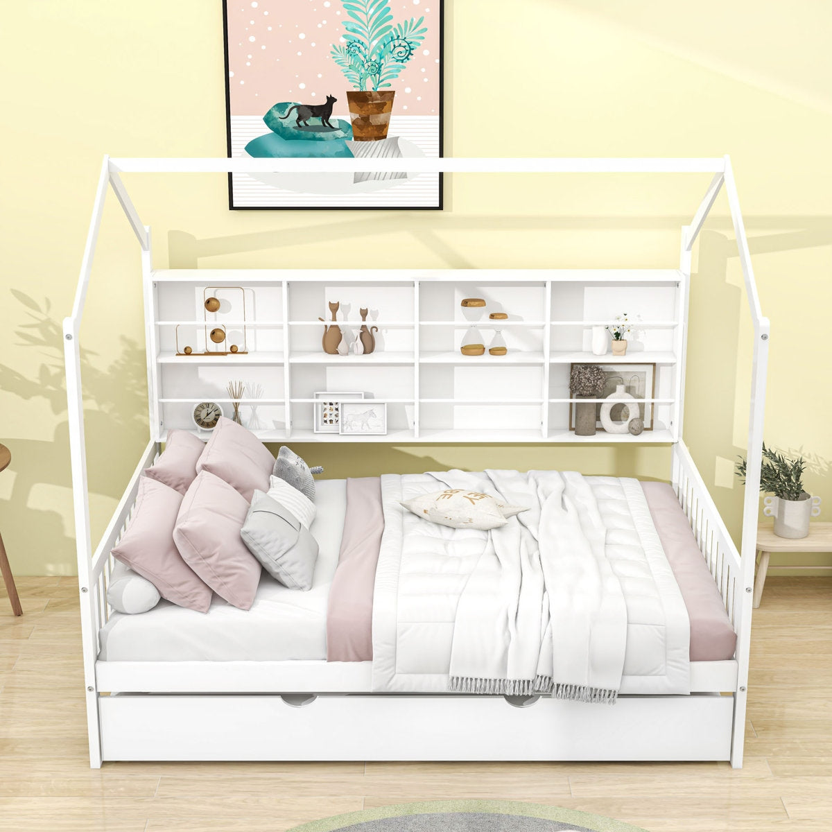 White children's bed with shelves and bedding in a room setting.