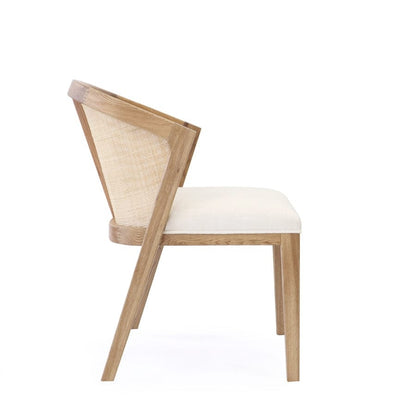 Wooden chair with white cushion on a white background