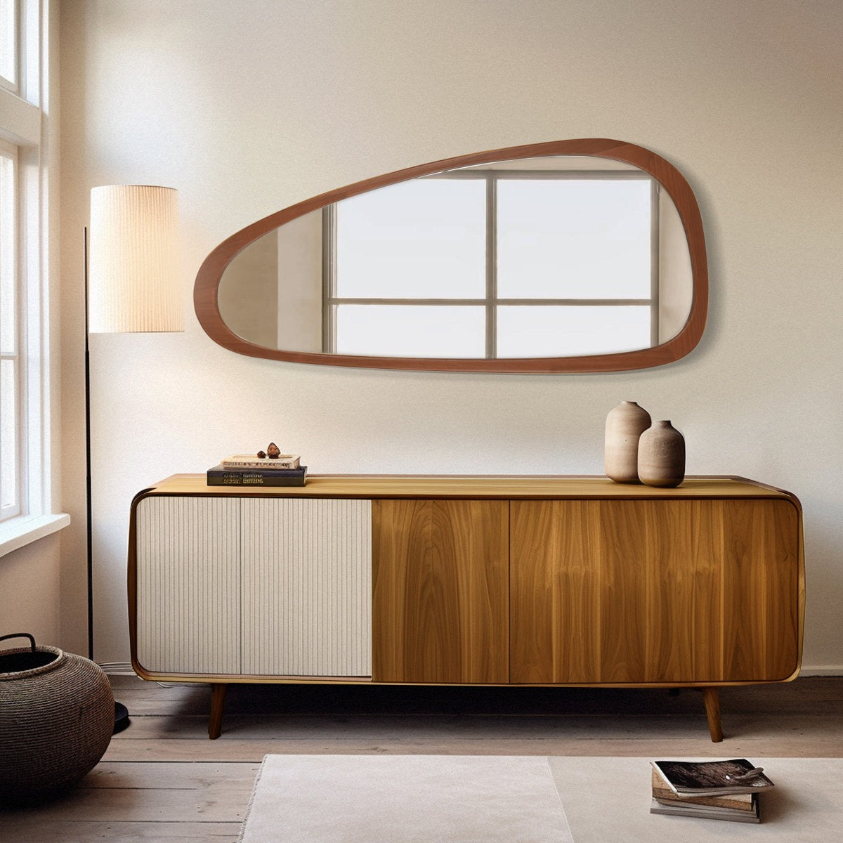 Wooden sideboard with a mirror above it in a modern room.