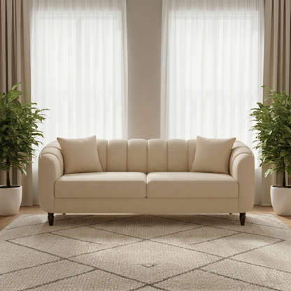 Beige sofa in a living room with plants and curtains