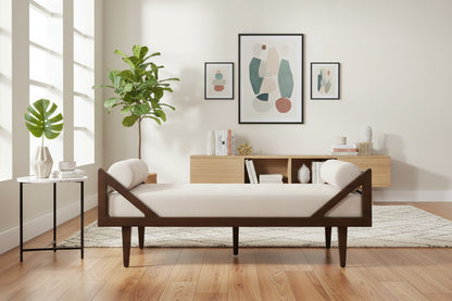 Modern bedroom with wooden bed, side table, and abstract art on the wall.