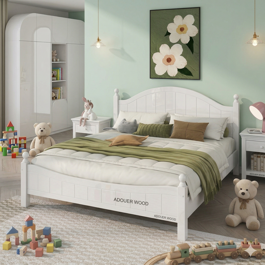 Children's bedroom with a white bed, toys, and a teddy bear.