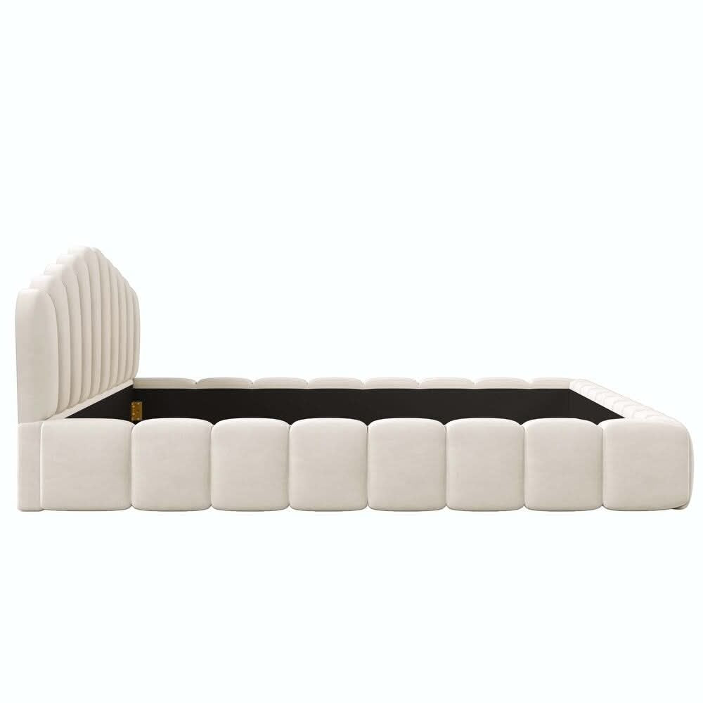 Modern bed with white upholstered frame and black mattress on a white background