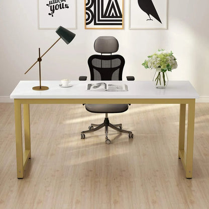 Modern office desk with chair, lamp, and decor in a room.