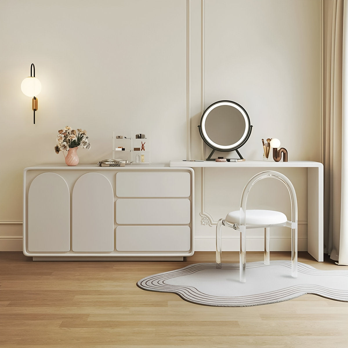 Modern vanity setup with a mirror, chair, and decorative items in a minimalistic room.