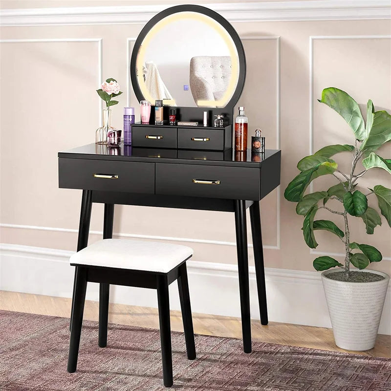 Modern white vanity dressing table with LED mirror and gold handles, featuring four drawers and a stool in a bedroom setting.