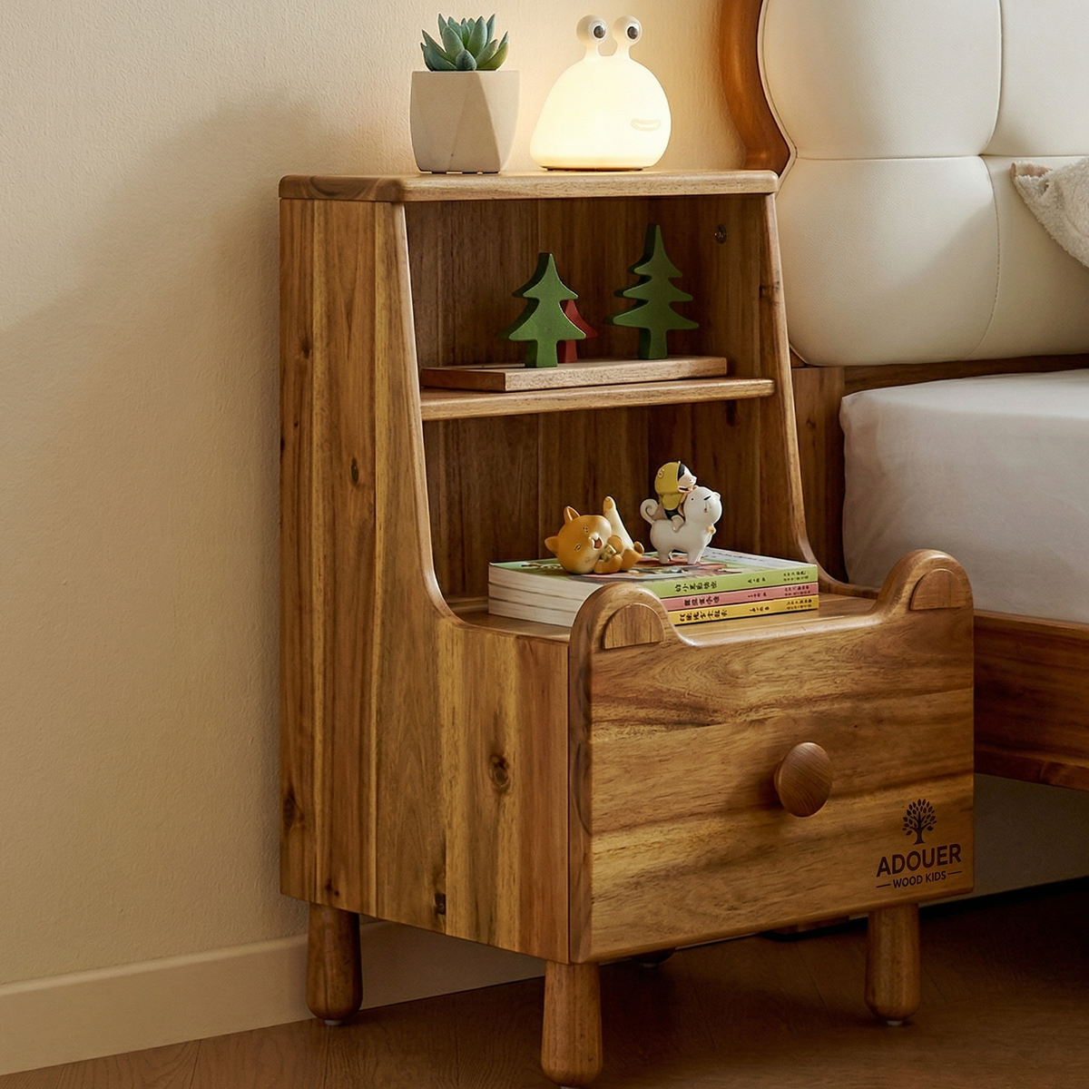Wooden nightstand with books, toys, and a lamp in a bedroom setting.
