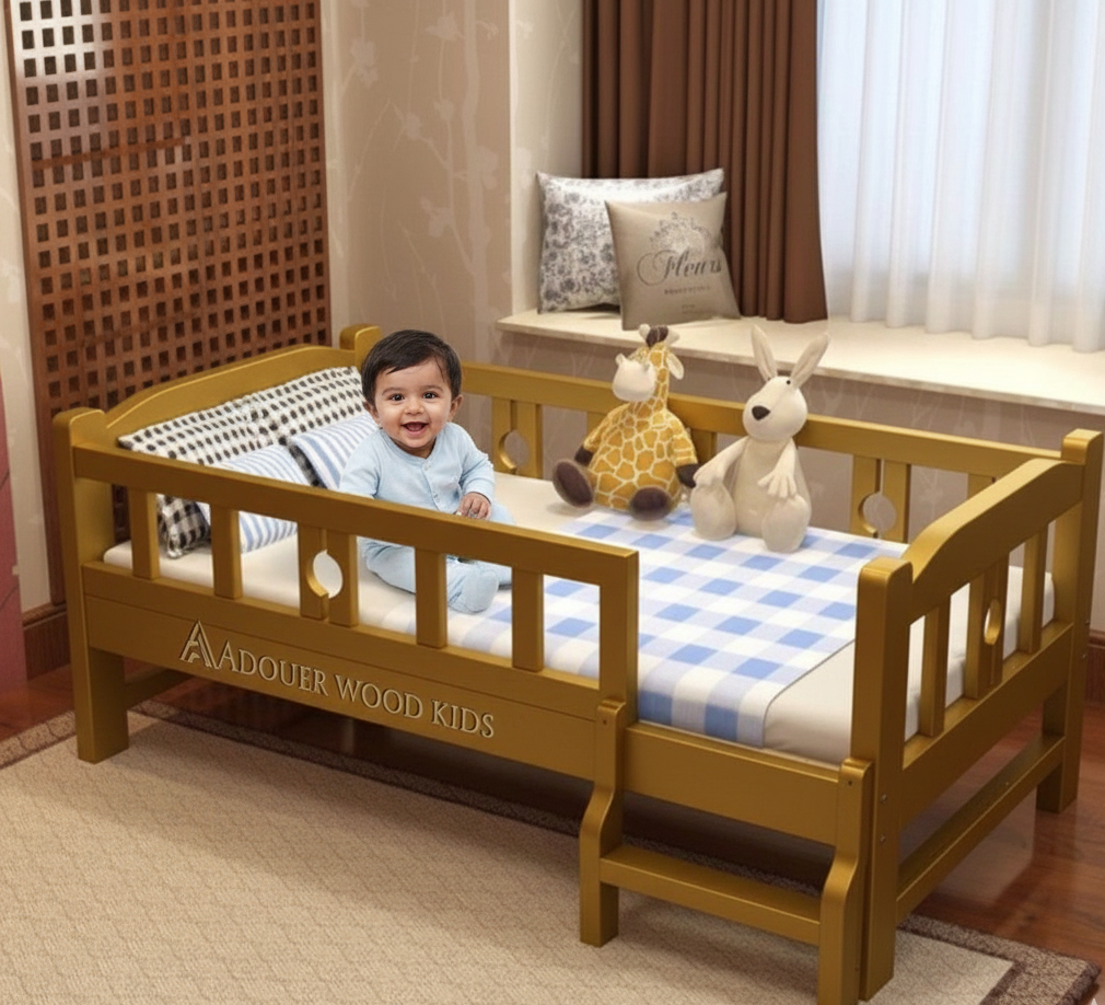 Child in a wooden crib with stuffed animals, in a room with a window and decorative pillows.
