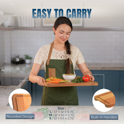 Woman holding a wooden cutting board with vegetables in a kitchen setting, emphasizing ease of carrying.